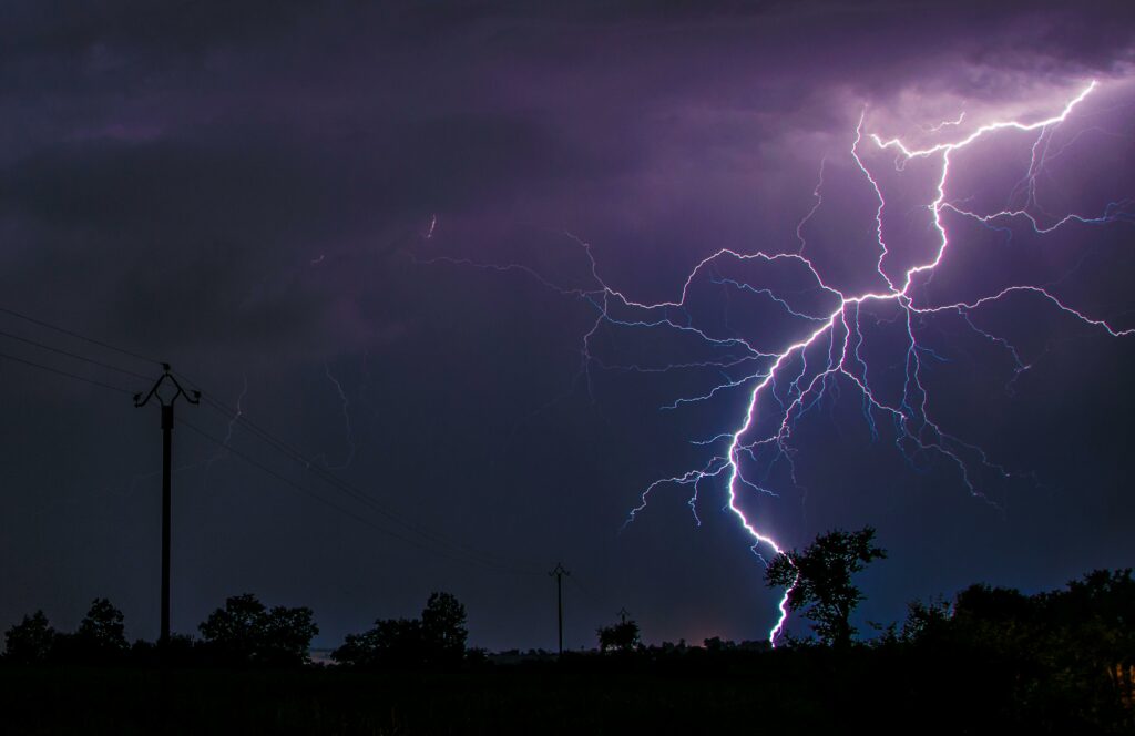 A stunning lightning strike captured during a thunderstorm in Flavin, Occitanie, France.