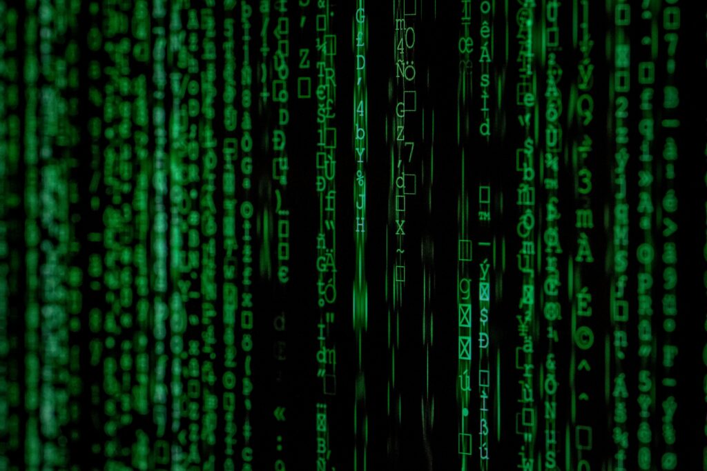 S'informer - Se former Abstract green matrix code background with binary style.